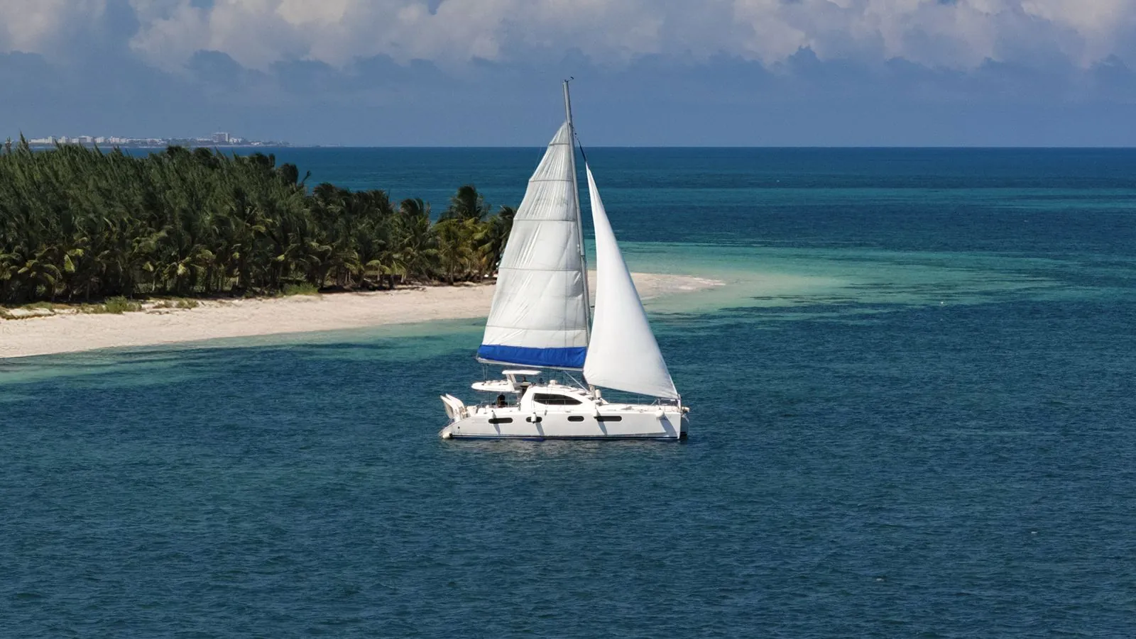 Isla Mujeres Aquamaran: Sail, Snorkel and Drinks Included